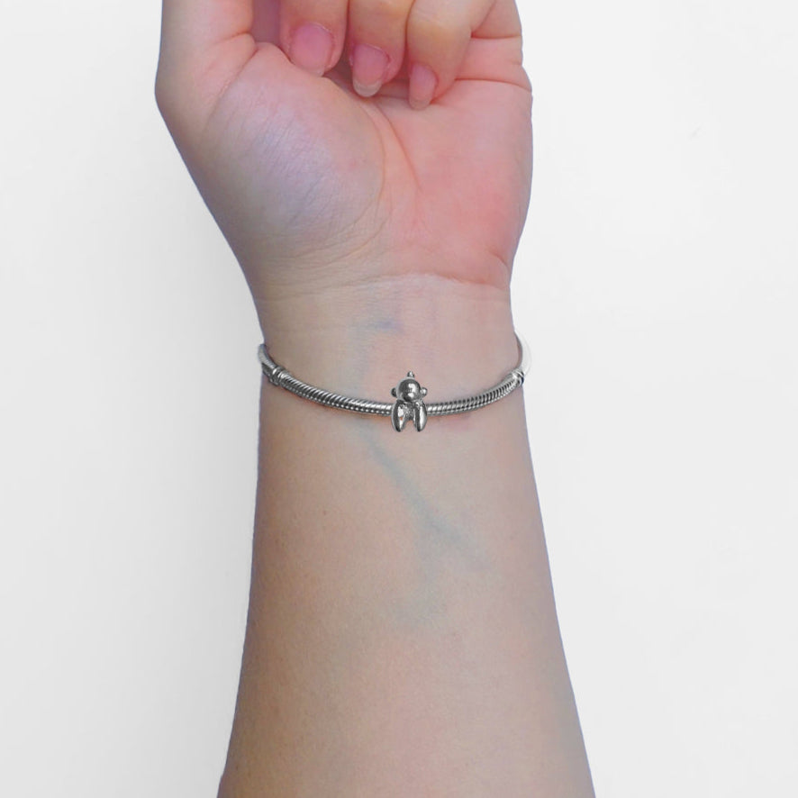 Mono globito charm - Mi tienda
