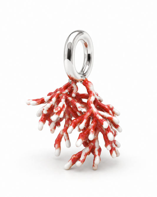 Red coral charm in 950 sterling silver, handcrafted Costa Rican jewelry, product photo on white background